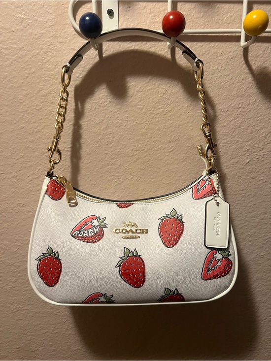Coach Handbags - Coach White Leather Shoulder Bag with Red Strawberry Motif
